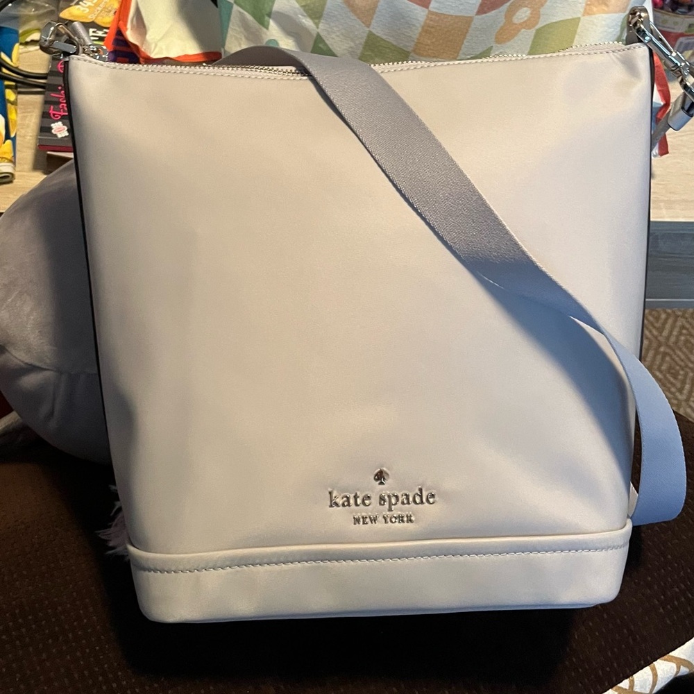 Kate Spade just purchased never used shoulder bag. Dove grey.